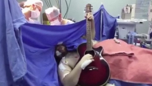 Watch This Man Play The Beatles while present process brain surgery