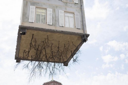 Why is this house Dangling From The Arm Of A Crane?