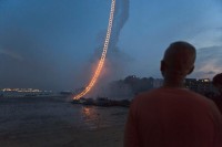 This Fiery Ladder Climbs half A Kilometer Into The night time Sky