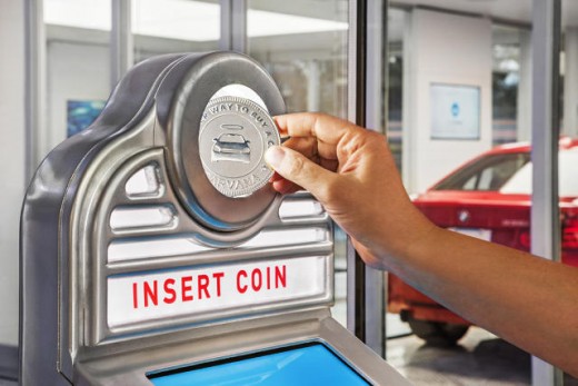 This 5-Story Glass car merchandising computing device Is Coin-Operated