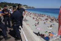 French official threatens lawsuits over internet photos of police