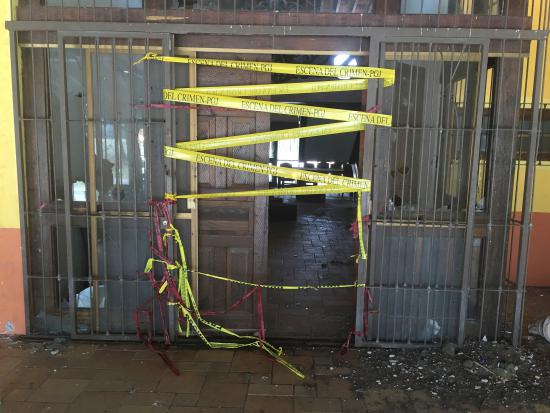 Police tape is seen at the entrance of a ranch where a firefight of armed civilians with federal forces at a ranch in Tanhuato