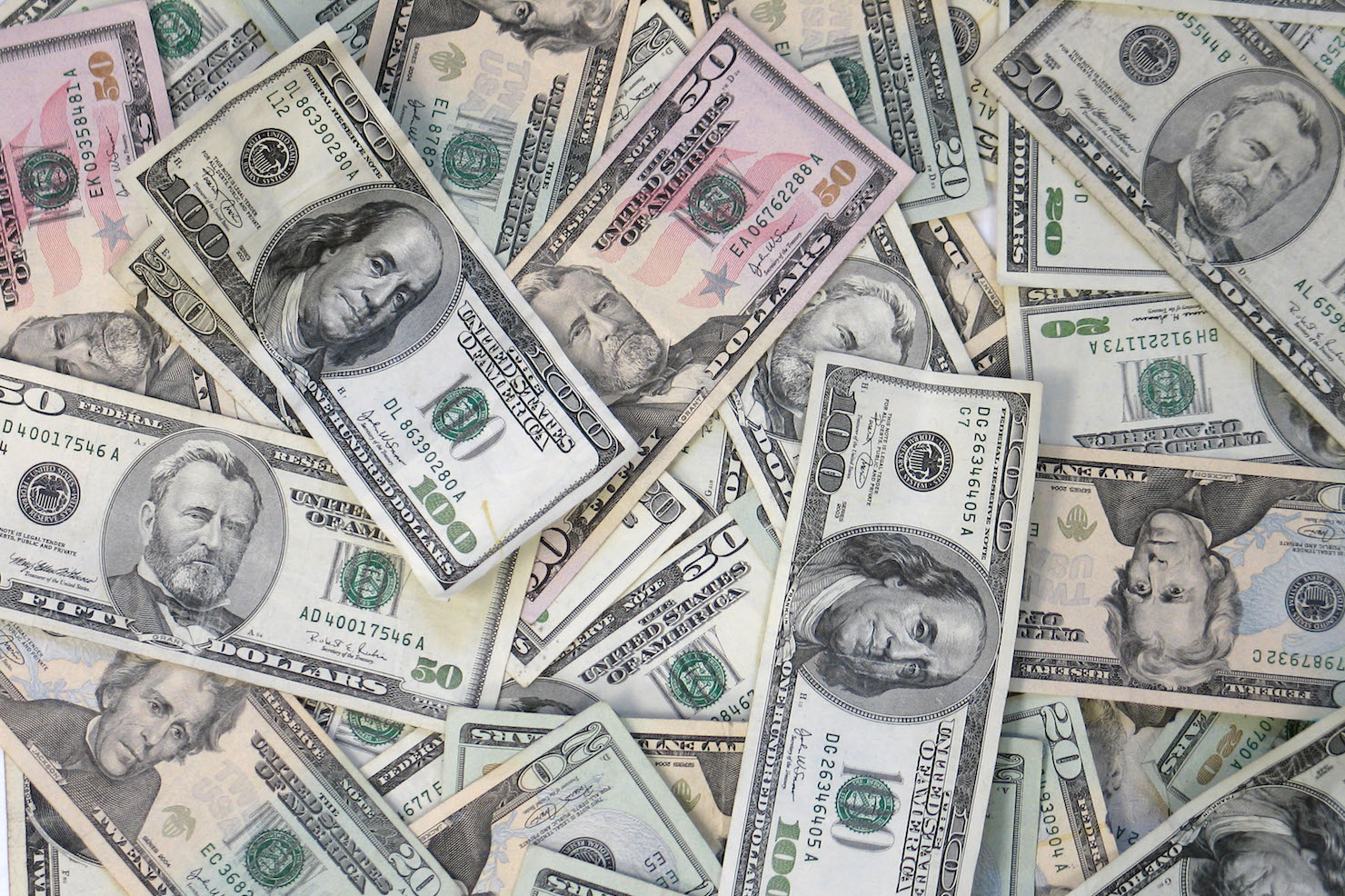 SessionM Snags $35M From General Atlantic, Salesforce, & Others - Pile of money stock image