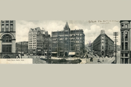Pioneer Square, Seattle, circa 1906, from a public domain image collected by Rob Ketcherside, [CC BY 2.0 (http://creativecommons.org/licenses/by/2.0)], via Wikimedia Commons.