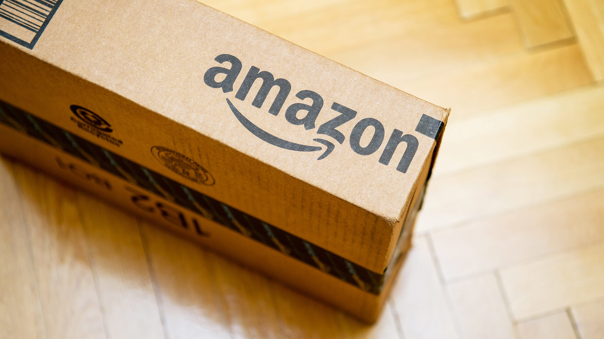 Amazon matches Walmart, drops free shipping minimum to $35