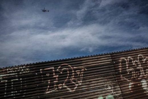 These Photos Take You Into The Makeshift Community Pressed Against The Border Wall