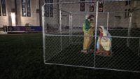 Creativity in protest: This church set a nativity scene in a cage