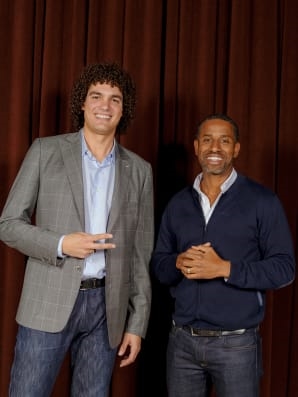 Verejao smiles for a photo with Hamet Watt, a partner at Upfront Ventures. Photos: Damien Maloney for Fast Company | DeviceDaily.com