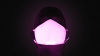 This mask glows if you have COVID