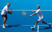 John McEnroe is playing tennis against a virtual version of himself on ESPN+