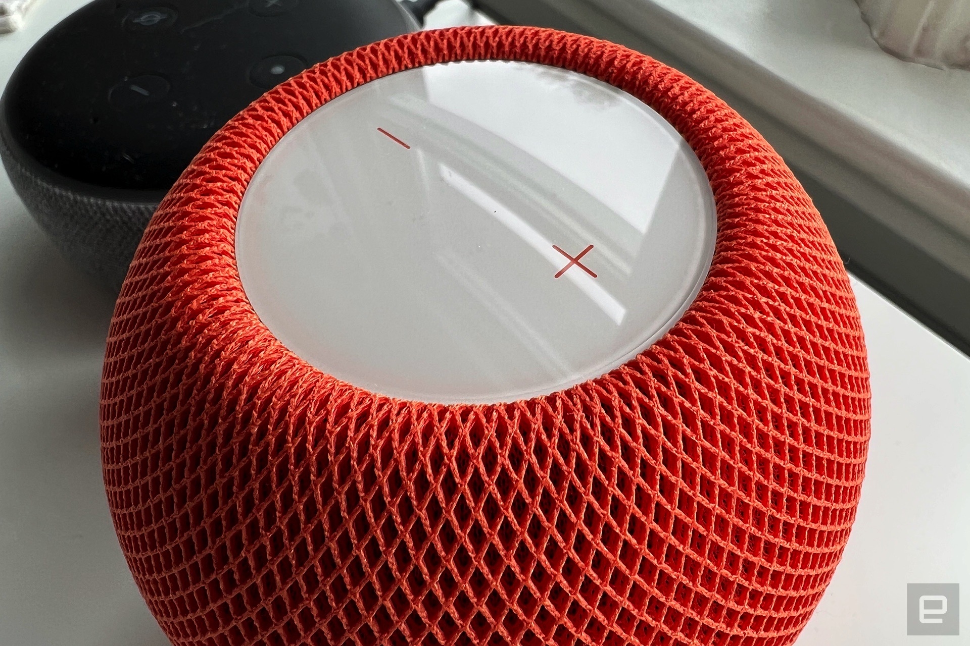 Apple HomePod mini in orange | DeviceDaily.com