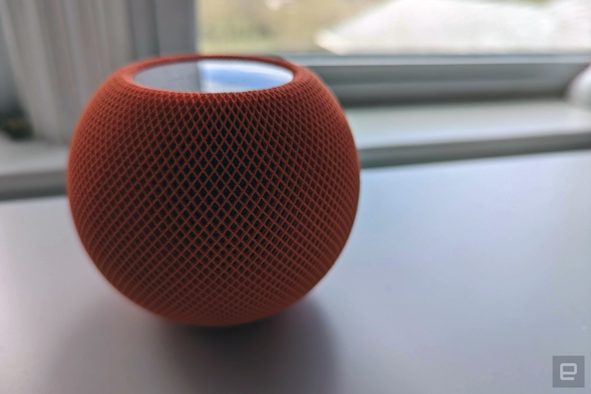 HomePod mini in orange | DeviceDaily.com