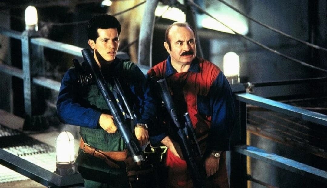 Bob Hoskins and John Leguizamo are shown playing Mario  and  Luigi in the 1993 movie adaptation of the game. | DeviceDaily.com