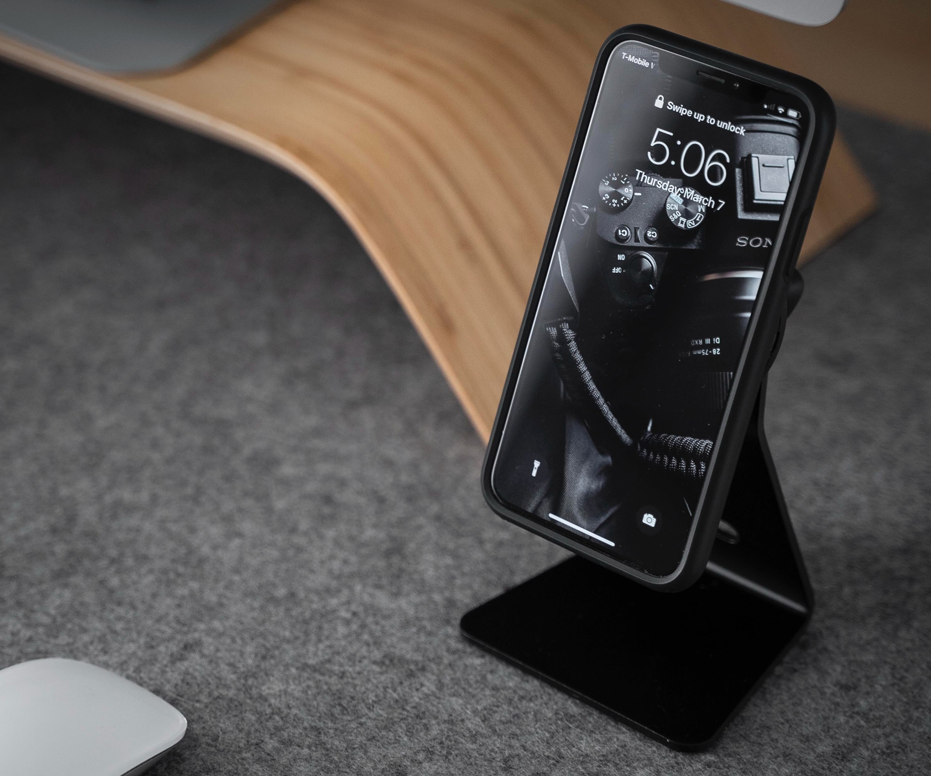 iPhone on wireless charging stand | DeviceDaily.com