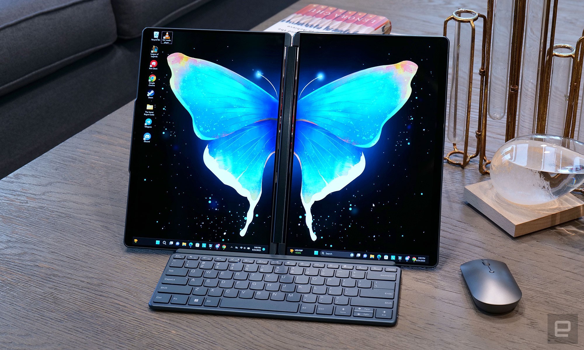 The Yoga Book 9i's side-by-side dual-screen mode is great for being able to reference sources while writing. | DeviceDaily.com