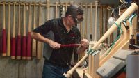 A backyard accident led this dad to design a new bat that is changing Major League Baseball