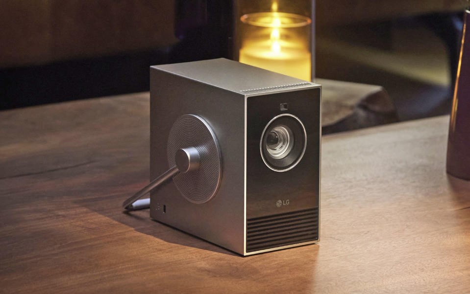 LG is bringing a 4K projector with a weird handle to CES 2024 | DeviceDaily.com