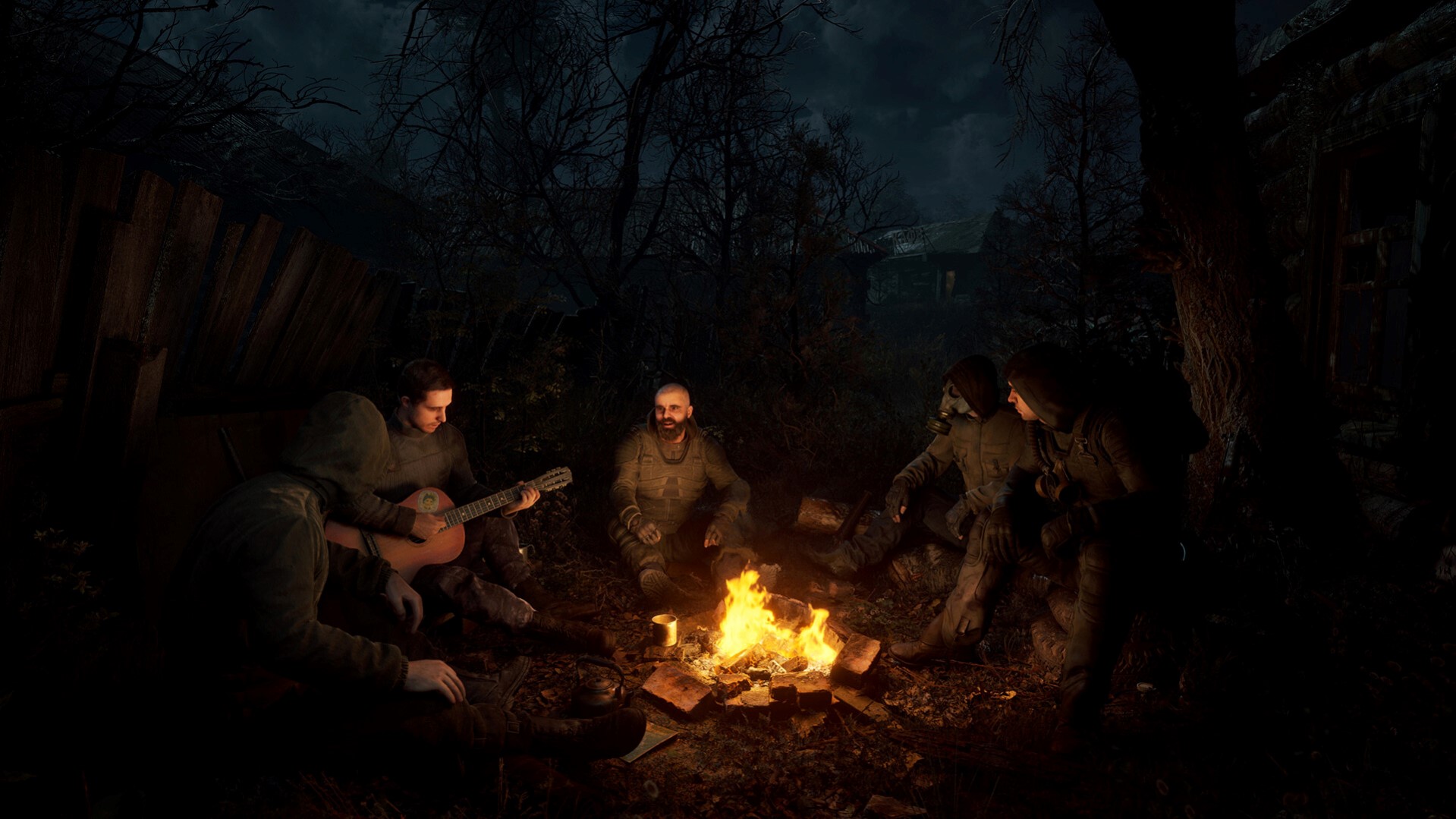 Comrades sitting around a campfire in Stalker 2 | DeviceDaily.com
