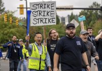 Boeing machinists vote overwhelmingly to reject contract offer and strike