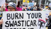 Protests target Tesla showrooms worldwide over Musk’s role with DOGE