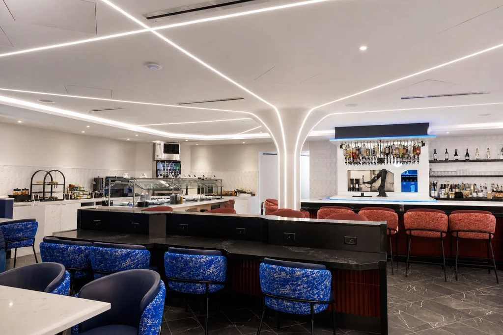 Forget boring airport lounges. This new one has a robot bartender and Mario Kart | DeviceDaily.com